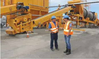  ??  ?? Sheldon Williams [Snr] gives Mayor Fraser Tolmie a tour of the plant.