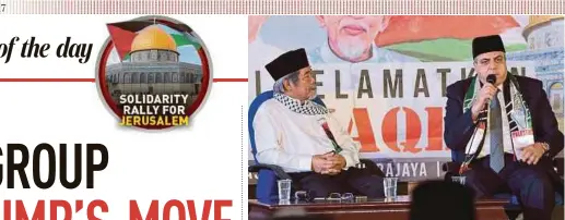  ?? BERNAMA PIC ?? Palestinia­n ambassador to Malaysia Datuk Dr Anwar Al Agha (right) speaking at a forum held in conjunctio­n with the Solidarity Rally For Jerusalem in Putrajaya yesterday.