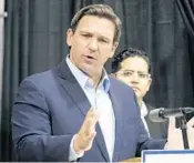  ?? MARTA LAVANDIER/AP ?? Gov. Ron DeSantis is facing extensive and chronic recruitmen­t and retention problems within his own Florida Highway Patrol, which continues to lose officers to higher-paying local police agencies.