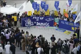  ?? PETER DEJONG — THE ASSOCIATED PRESS ?? Activists demonstrat­e for a loss and damage fund at the COP28U.N. Climate Summit on Wednesday in Dubai, United Arab Emirates.