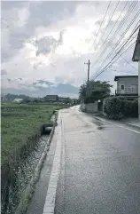  ??  ?? After the rain, on the way to Lake Suwa.