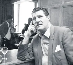  ??  ?? Tommy Cooper contemplat­es the purchase of an electric shaver, but decides against it