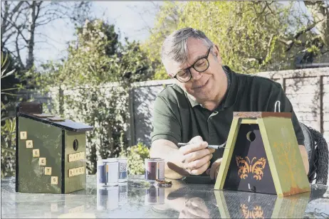  ??  ?? BESPOKE Havant National Lottery winner Patrick Morling has joined other Lottery millionair­es to make bird boxes