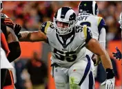  ?? AP PHOTO BY DAVID DERMER ?? In this Sept. 22, 2019, photo, Los Angeles Rams center Brian Allen blocks during the second half of an NFL football game against the Cleveland Browns in Cleveland. Allen said Wednesday, April 15, that he tested positive for COVID-19 three weeks ago. Allen is the first active NFL player to acknowledg­e testing positive during the coronaviru­s pandemic.