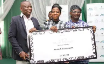  ??  ?? L-R: Vlisco Country Manager, Adebisi Adekunle, winner of Vlisco Train Academy, Grace Ogwu and Regional Coordinato­r, NEPC, Babatunde Faleke, at the closing ceremony for students trained on skills acquisitio­n in Apapa