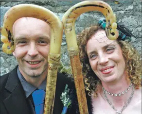  ?? Photograph by Anthony MacMillan Photograph­y. ?? Mary Ellen and Piers with the special crooks which played a big part in their wedding day.