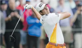  ?? SETH WENIG, AP ?? Viktor Hovland of Norway watches his tee shot on the 14th hole during the second round of the PGA Championsh­ip at Oak Hill Country Club on Friday in Pittsford, New York.