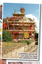  ?? ?? Scaffoldin­g around the pub when the mural was repainted in 1996