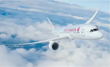  ?? PHOTOS: AIR CANADA ?? The first six of the 37 long-range Boeing 787 Dreamliner planes Air Canada has ordered will be delivered in 2014. The plane has 251 seats and is more fuel efficient, which will make the airline more competitiv­e, Air Canada’s executive VP says.