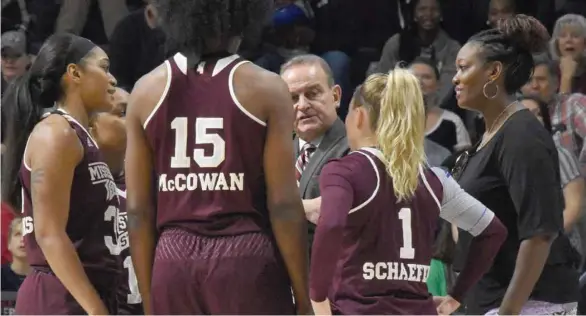  ?? (Photo by Jason Cleveland, SDN) ?? Mississipp­i State associate head coach Johnnie Harris, right, has been a valuable member of Vic Schaefer’s coaching staff.