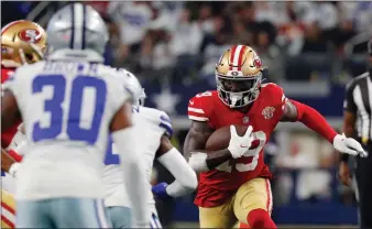  ?? Tribune News Service/getty Images ?? Deebo Samuel (19) of the San Francisco 49ers carries the ball after a reception against the Dallas Cowboys during the second quarter in the NFC Wild Card Playoff game at AT&T Stadium on Jan. 16 in Arlington, Texas.