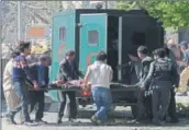  ??  ?? A victim of the blast is carried on a stretcher to an ambulance by volunteers and response units on Wednesday. AFP