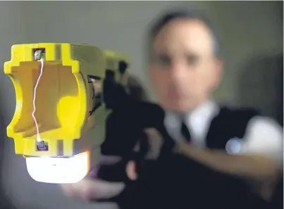  ?? Picture: PA. ?? British Transport Police officers are to be equipped with Tasers.