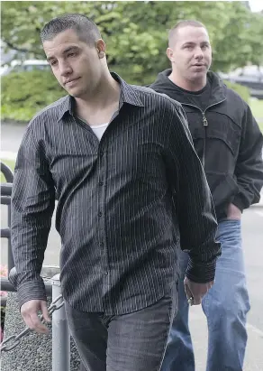  ?? RICK COLLINS/SPECIAL TO PNG FILES ?? Jonathan Bacon, left, appears in Abbotsford court in 2008 to face drug and weapons charges, three years before he was killed. Three men are now on trial for that murder.