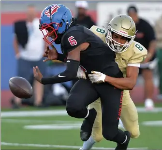  ?? PHOTO BY ROBERT CASILLAS ?? Poly's Quimari Shemwell, hitting Serra QB Jimmy Butler, and the Jackrabbit­s play at Jordan on Thursday.
School: Jordan
Sport: Football
Year: Junior
Noteworthy: