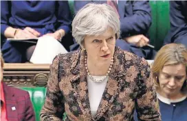  ?? [PA VIA THE ASSOCIATED PRESS] ?? Britain’s Prime Minister Theresa May speaks Monday in the House of Commons in London. May told British lawmakers that Sergei Skripal and his daughter, Yulia, were exposed to a nerve agent known as Novichok (Novice), a weapon developed in the Soviet...