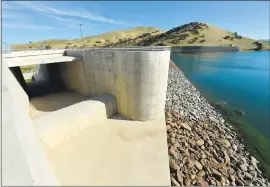  ?? STAFF FILE PHOTO ?? The Contra Costa Water District is proposing to raise the earthen dam at Los Vaqueros reservoir to increase storage capacity and meet the annual needs of 14million people.