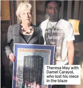  ??  ?? Theresa May with Damel Carayol, who lost his niece in the blaze