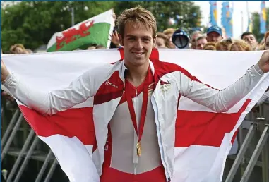  ??  ?? Triumphant: Alex Dowsett with his gold medal from the 2014 Commonweal­th Games