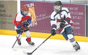  ??  ?? Dundee Stars U/16s Jack Terroni keeps control of the puck during their defeat against Edinburgh.