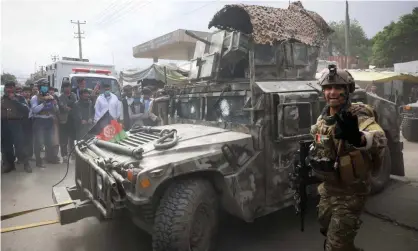  ??  ?? Afghan security officials in Kabul. Photograph: Hedayatull­ah Amid/EPA