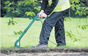  ??  ?? Cutting it
South Lanarkshir­e residents can access gardening services from the council