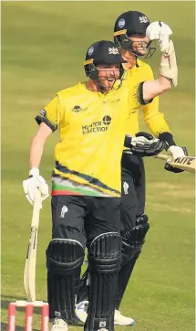  ?? Picture: Harry Trump/Getty ?? Tom Smith celebrates after hitting the winning runs in the Vitality Blast group game against Somerset at the Bristol County Ground 11 days ago