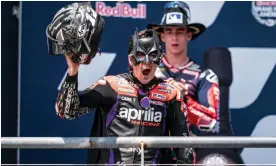  ?? Photograph: Steve Wobser/Getty Images ?? Maverick Viñales dons a Batman mask to celebrate his win on the podium.