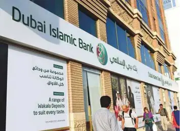  ?? Arshad Ali/Gulf News ?? A Dubai Islamic Bank branch in Bur Dubai. The Islamic lender reported a first-quarter net profit Dh1.21 billion, up 16 per cent on the Dh1 billion reported in the same period last year.