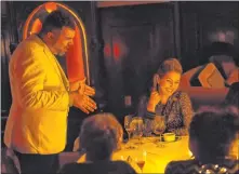  ?? Benjamin Hager Las Vegas Review-journal file ?? Psychic medium Thomas John, left, gives Eileen Lorraine good news about her deceased father during Dinner with the Dead in 2017 at the Foundation Room at Mandalay Bay.