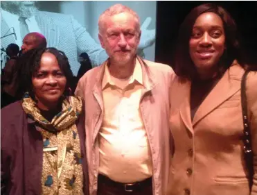  ??  ?? Controvers­y: Jeremy Corbyn with new peer Martha Osamor and her MP daughter Kate