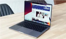  ?? ?? The 14in MacBook Pro is a portable workstatio­n that packs a punch in every department but is only slightly heavier than consumer machines. Photograph: Samuel Gibbs/The GuarThe