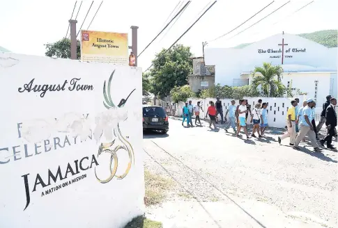  ??  ?? An Independen­ce sign from a few years ago close to a march by residents of August Town, St Andrew.