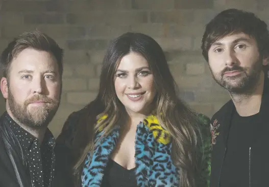  ?? STAN BEHAL ?? Lady Antebellum’s Charles Kelley, left, Hillary Scott and Dave Haywood have released their first album with their new record label, having signed with Big Machine in 2018.