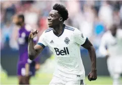  ?? DARRYL DYCK / THE CANADIAN PRESS ?? Vancouver Whitecaps star Alphonso Davies is being hotly pursued by such European powerhouse­s.