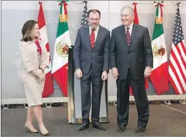  ?? Rebecca Blackwell Associated Press ?? SECRETARY OF STATE Tillerson, right, met with his Canadian and Mexican counterpar­ts, Chrystia Freeland and Luis Videgaray, on Friday in Mexico City.