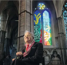  ?? VICTORIA JONES ?? British artist David Hockney designed The Queen’s Window that was unveiled at Westminste­r Abbey Wednesday. The 81-year-old was approached to design the tribute because he is “the most celebrated artist alive,” said Dean of Westminste­r John Hall.