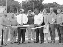  ?? RICARDO RAMIREZ BUXEDA/STAFF PHOTOGRAPH­ER ?? Boone administra­tors and supporters celebrated the official unveiling of a new artificial turf field on Friday but the opening game was postponed.