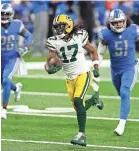  ?? RAJ MEHTA/USA TODAY SPORTS ?? Packers wide receiver Davante Adams (17) runs with the ball after a catch for a touchdown against Lions on Dec. 13.