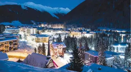  ?? (EFE) ?? POSTAL. La ciudad de Davos es una estación de esquí,en los Alpes suizos, considerad­a la mayor vitrina de contactos económicos del mundo.