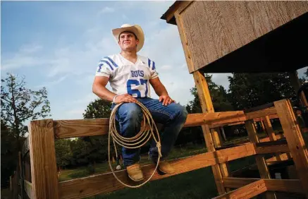  ?? STAFF PHOTOS BY DOUG STRICKLAND ?? Boyd-Buchanan junior linebacker and fullback Will Watkins, who is also an accomplish­ed rodeo athlete with numerous national-award buckles and saddles, is adept at wrestling both steers and opposing ball carriers to the ground.