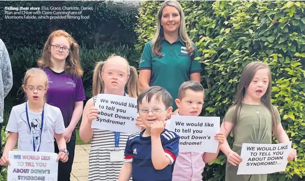  ?? ?? Telling their story Elsa, Grace, Charlotte, Daniel, Rian and Chloe with Claire Cunningham of Morrisons Falside, which provided filming food