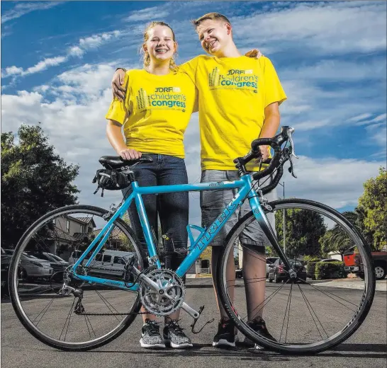  ?? Benjamin Hager ?? Las Vegas Review-journal @benjaminhp­hoto Oaklie and Erick Leavitt plan to participat­e in a 100-mile bike ride through Northern Colorado for the JDRF Ride to Cure Diabetes fundraiser, which is Aug. 24-27.