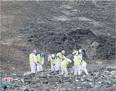  ??  ?? Police search the landfill site for Corrie McKeague.