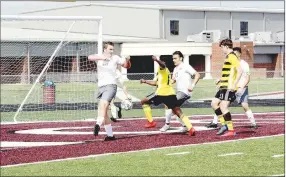  ?? MARK HUMPHREY ENTERPRISE-LEADER ?? Hunting a goal. Prairie Grove senior Asende Lubende penetrates the box looking to score a goal. The Tiger boys reached the District 4A West semifinals and qualified for state in 2019. They lost 6-0 to Valley View in the first-round of the 4A State tournament Thursday, May 9, at Batesville.