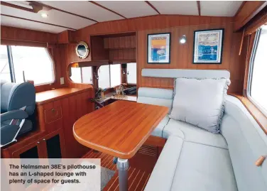 ??  ?? The Helmsman 38E’s pilothouse has an L-shaped lounge with plenty of space for guests.
