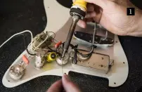  ??  ?? 1 Top-spec components, lovingly hand-wired, help hone the tone of Gray Guitars All major processes, from preparing finishes to hand-shaping necks, are performed in Gray’s compact but capable workshop Thomas pays close attention to the shape and feel of...