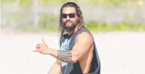  ?? Picture: NIGEL HALLETT ?? Jason Momoa looking super relaxed at Currumbin Alley while on the Coast to shoot the film.