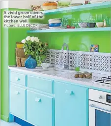  ?? Picture: ELLE DECOR ?? A vivid green covers the lower half of the kitchen wall.