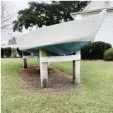  ?? PHOTOS : D AV E R E E D ?? With reliable winds, a protected bay, and a membership eager to host events and visitors, Pensacola YC has hosted a number of major dinghy events of late, utilizing its 22 acres of waterfront property and array of facilities. Fish Class Hull No. 1, built in 1940, adorns the club’s front entrance.